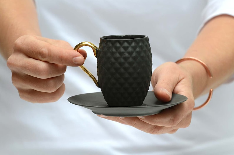 Small Black Textured Coffee Cup with Gold Handle