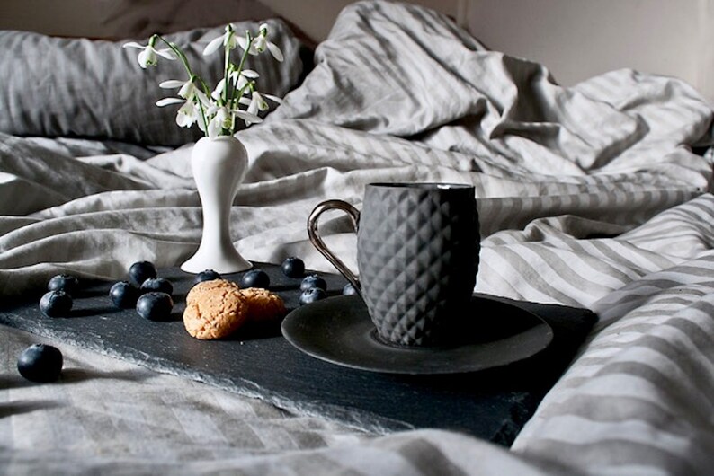 Small Black Textured Coffee Cup with Silver Handle