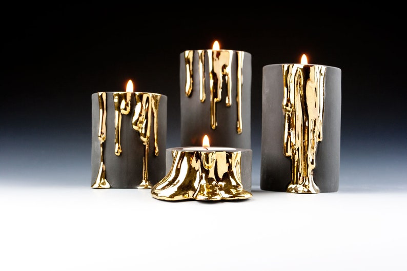 Black and Gold Candle Holders With Dripping Wax