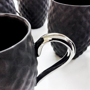 Small Black Textured Coffee Cup with Silver Handle
