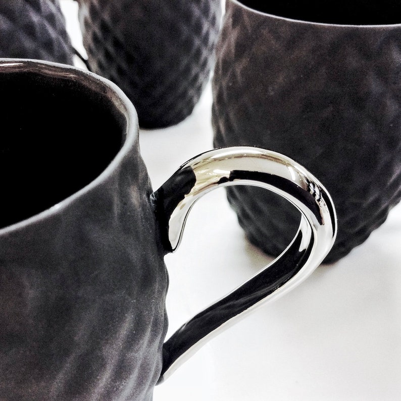 Small Black Textured Coffee Cup with Silver Handle