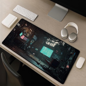 May include: A large rectangular mouse mat with a futuristic, cyberpunk-style scene featuring multiple computer screens and a red chair. The mat is black with a detailed, colourful graphic. A white keyboard, mouse, and headphones are also on the desk.