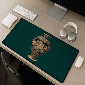 May include: A decorative mouse pad featuring a dark teal background and a detailed illustration of an antique vase. The vase is brown and gold, with intricate designs and figures. The mouse pad is rectangular and sits on a wooden desk.
