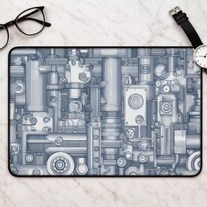 May include: A rectangular desk mat featuring a detailed, monochromatic blue and white illustration of complex industrial machinery, pipes, gears, and mechanical components with a dense, technical line-art aesthetic covering the entire surface.