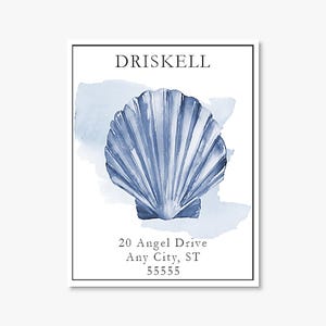 May include: A rectangular card with a black border features the name "DRISKELL" at the top. Below, a blue watercolor seashell design is centered. The address "20 Angel Drive, Any City, ST 55555" is printed at the bottom.
