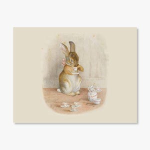 May include: A brown rabbit with a pink bow sits on a light brown floor and holds a small teacup. The rabbit is surrounded by a tea set with a teapot, sugar bowl, and several teacups and saucers.