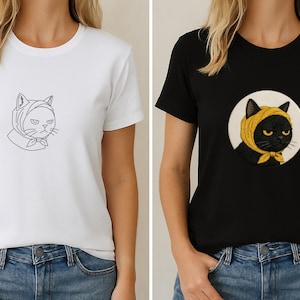 以下が含まれることがあります： 白と黒の2枚のTシャツ。どちらも猫のグラフィックが特徴です。白いシャツには、スカーフをかぶった猫の線画があります。黒いシャツには、黄色のスカーフとリボンをつけた黒猫が描かれています。