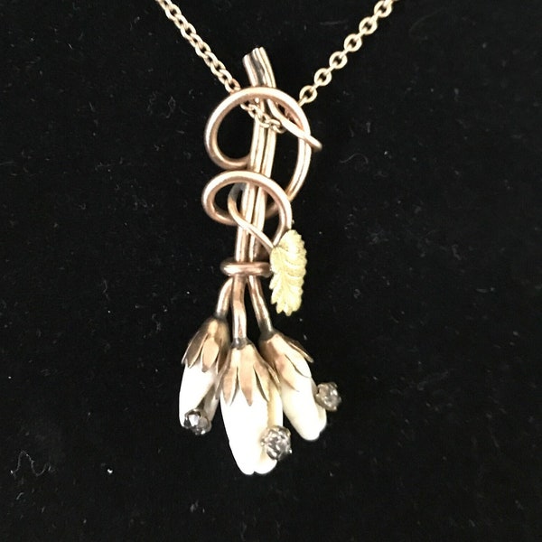 A gold filled jeweled shell victorian aesthetic necklace, lavaliere