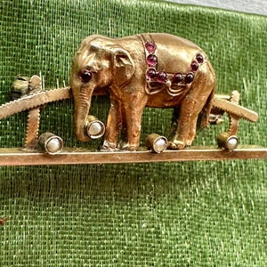 Exceptional gold jeweled Elephant late Victorian brooch, with genuine pearls and cab garnets-