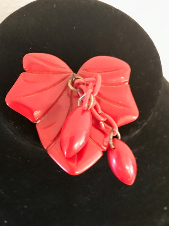 A vintage genuine large red Bakelite carved heart 