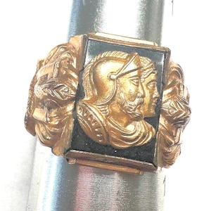 G.F. Deco ring artistic snake setting with Knights raised over Rectangular black stone, big s- 12