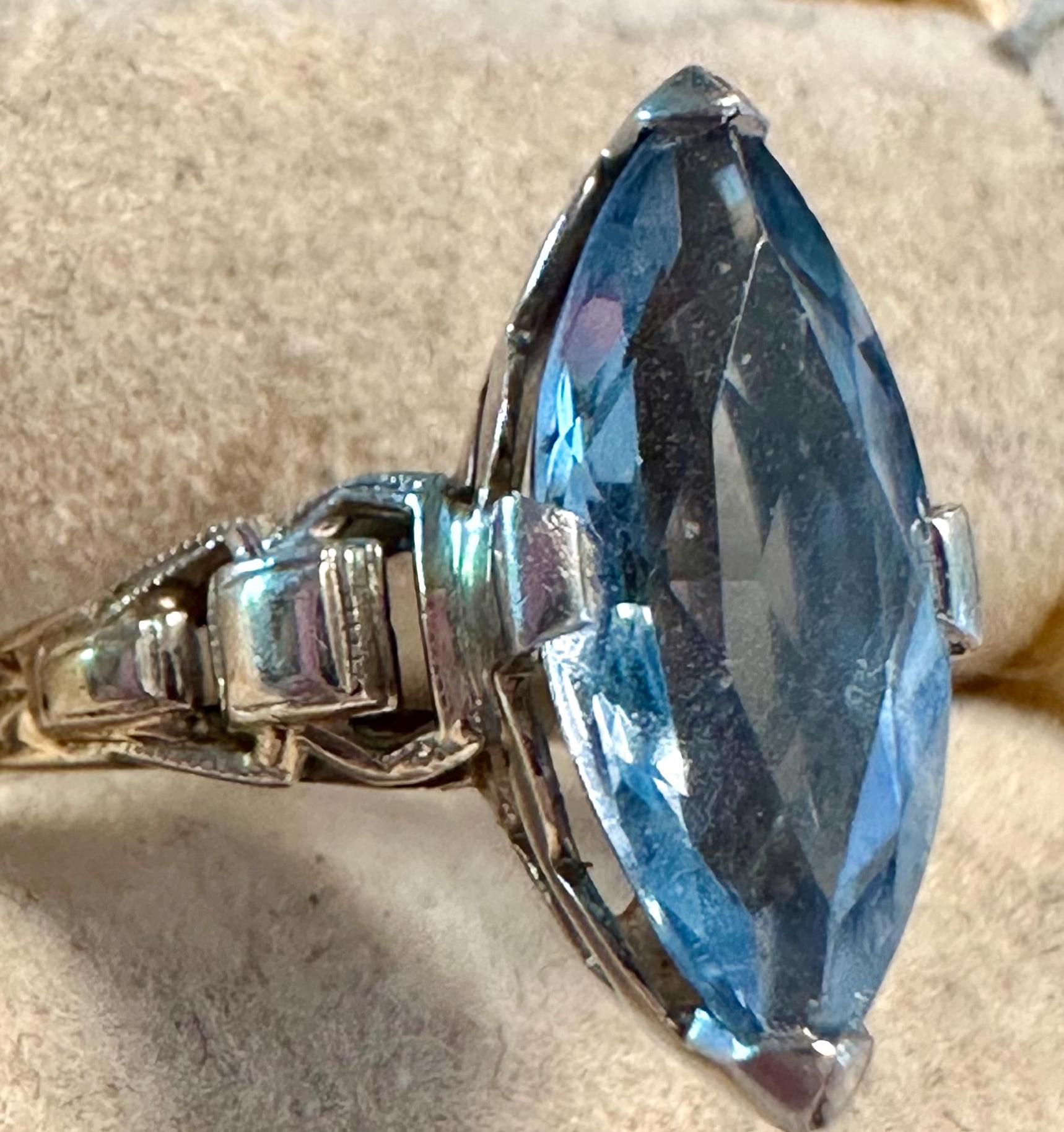A Mid Century 14k Gold Man Made Sky Blue Faceted Navette Ring. Size-4 ...