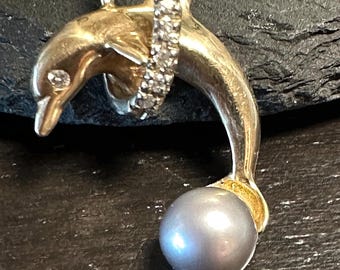 14k charm Dolphin jumping through Diamond Hoop