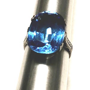 Deco sterling dazzling faceted sapphire blue glass finely designed and executed ring.  Size 6 1/2