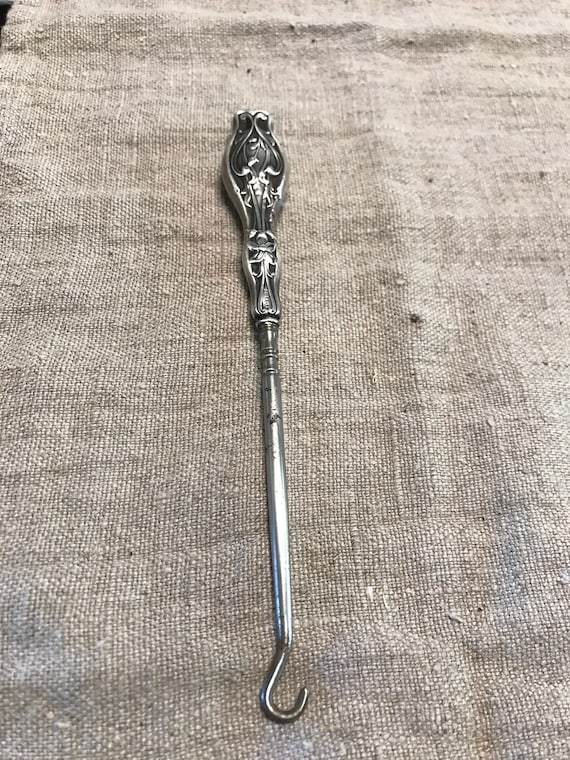 Sterling button hook, Art Nouveau floral motif