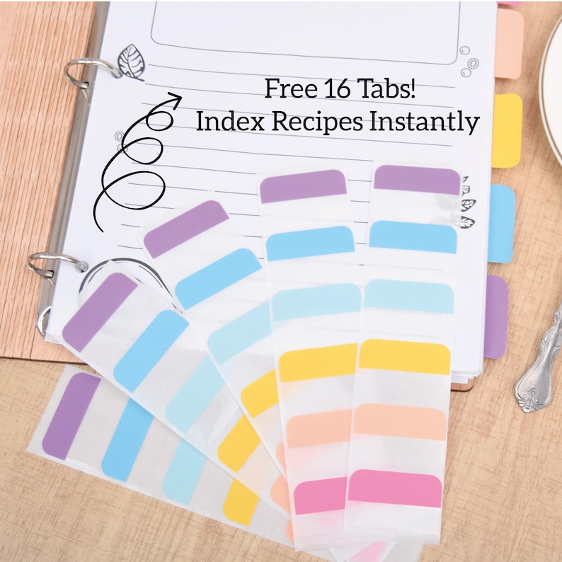 K&ouml;nnte beinhalten: Ein Rezeptordner mit farbigen Indexkarten. Die Registerkarten sind in verschiedenen Farben gehalten, darunter Lila, Blau, Gelb und Rosa. Auf der Seite steht "Free 16 Tabs! Index Recipes Instantly."