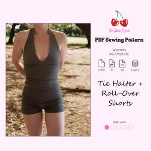 May include: A woman wearing a dark green ribbed halter top and matching roll-over shorts. The image includes text for a PDF sewing pattern, "Tie Halter + Roll-Over Shorts" and "The Girls Room".