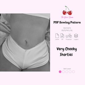 May include: A monochrome image showcasing a PDF sewing pattern for "Very Cheeky Shorties." The pattern is available in sizes XS to XL. The image includes a cherry logo and the text "The Girls Room."