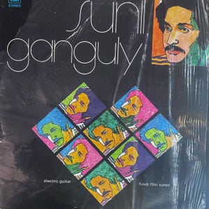 May include: A vintage vinyl record album cover featuring the name "Sunil Ganguly" in white script. The cover has a black background with a diamond-shaped pattern of colorful portraits and a portrait of a man in the upper right corner. The text "electric guitar" and "hindi film tunes" are also visible.