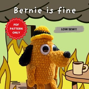 Könnte beinhalten: Ein gehäkelter Plüschhund mit gelbem Körper, schwarzen Ohren und einem gelben Hut mit schwarzem Band. Der Hund hat große Kulleraugen und sitzt vor einem Cartoon-Feuer. Der Text lautet "Bernie is fine", "PDF Pattern Only" und "Low Sew!!".