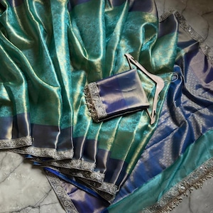 Royal blue emerald green banarasi soft Tissue silk saree with silver zari border