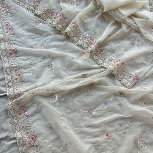 Pure Organza Embroidered Saree – Ivory Floral Sequins, Lace Border, Party Wear Ethnic