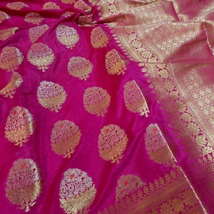 Royal banarasi soft silk saree with intricate zari buta weaving and perfect for wedding & Festive occasions