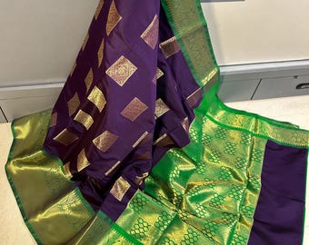 Graceful banarasi soft silk saree with Rich golden zari pallu and elegant golden motifs