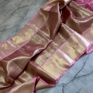 Banarasi soft tissue silk saree elegant golden pink zari weaving light weight party festive wear
