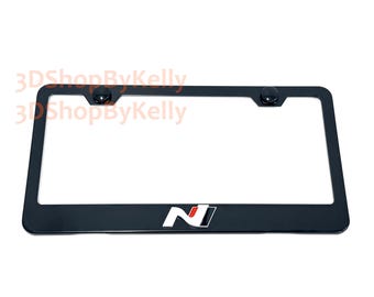 Black Metal License Plate Frame with 3D N Badge, Car Tag Holder, Fits Standard US License Plates, Screw Caps Included
