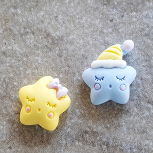 2 Sleepy Star Flat Back Embellishment Buttons.