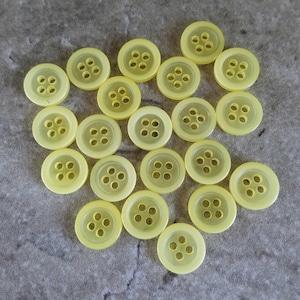 21 Yellow Solid Outer Rim 4 Hole Round Buttons Size 7/16&quot;
