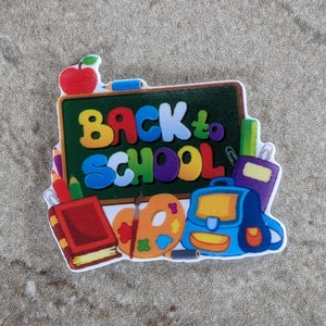 May include: A colorful back to school themed image with a chalkboard, a paint palette, a book, a pencil, and a backpack. The chalkboard says "Back to School" in colorful letters.