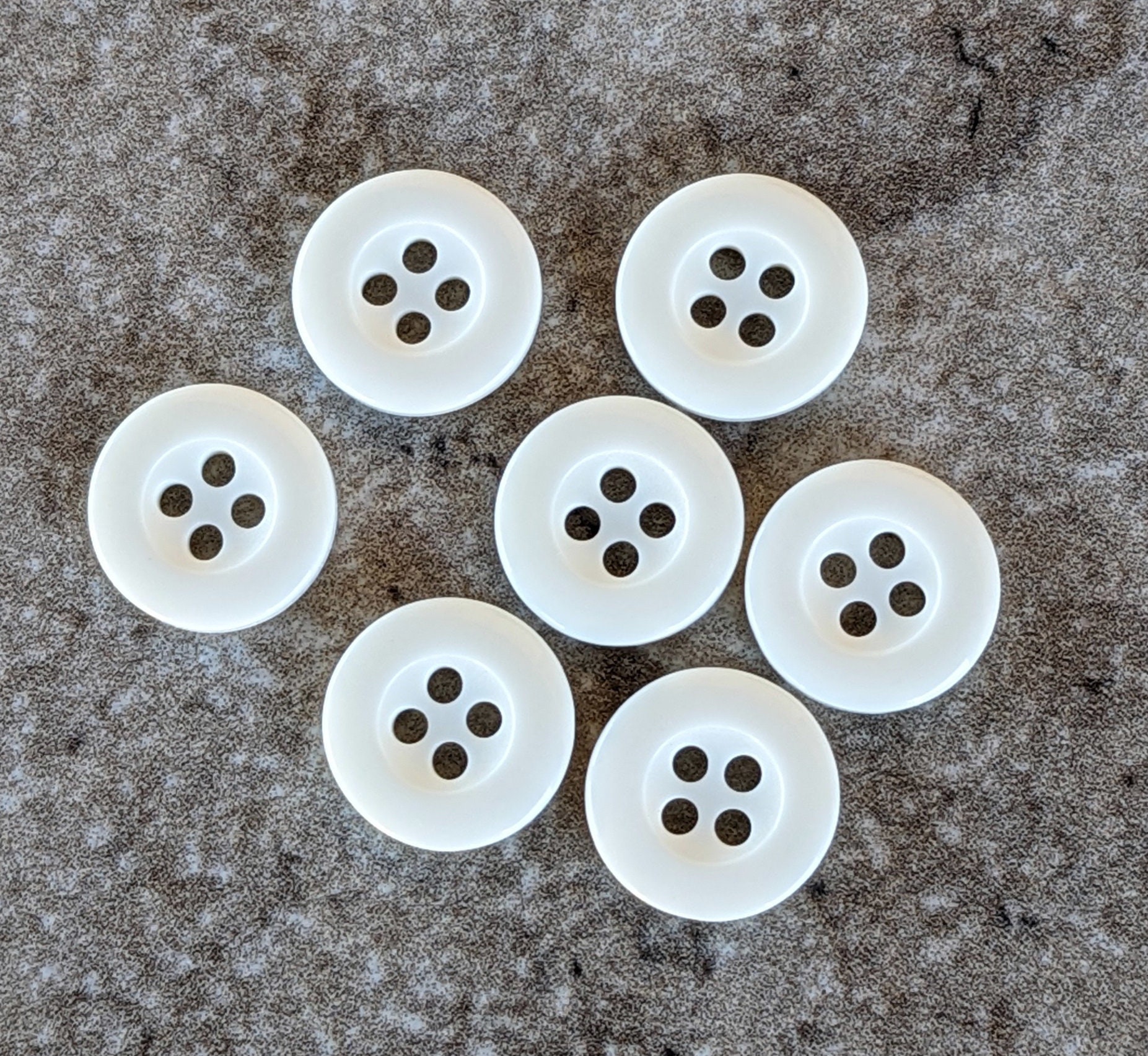 7 off White Rounded Rim Round Buttons Size 1/2