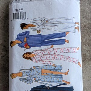 May include: A Butterick sewing pattern envelope, featuring illustrations of sleepwear and robes. The pattern number is 6837, and the size is XS, S, M. The illustrations show various styles of pajamas and robes in different colors and patterns.
