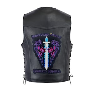 May include: A black leather vest featuring side lacing and a large back patch. The patch displays a silver sword with blue and purple wings, a small yellow halo, and the text "BORROWED ANGELS" above and "CHARITY RIDERS" below the graphic.