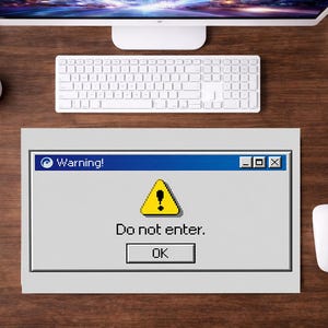 May include: A rectangular desk mat featuring a retro computer operating system warning window graphic. The window has a blue title bar with the text Warning!, a yellow triangle with an exclamation point, the text Do not enter., and an OK button.