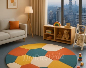 May include: A colorful, round rug with a geometric pattern in shades of orange, yellow, teal, and cream. The rug is placed on a gray floor in a room with a city view. The text "The Rug Veda" is visible on the rug.