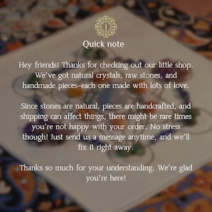 May include: A white card with the text "Quick note" and a message about natural crystals, raw stones, and handmade pieces. The message thanks customers and offers support. The background is blurred.