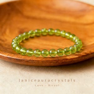 Pulsera de peridoto natural de 8 mm, elástica, ideal para el día a día.