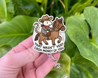 Carrete de identificación retráctil con diseño de zarigüeya vaquera: divertido