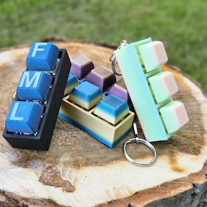 Keyboard clicker fidget keychain