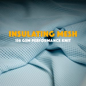 May include: Close-up of a light blue insulating mesh fabric. The text "INSULATING MESH" is in orange, and "156 GSM PERFORMANCE KNIT" is below it. The fabric has a textured, open weave pattern, and is folded and draped.