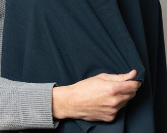 Tejido Softshell Cordura® Merino: tejido técnico elástico con forro de lana. Material para chaquetas y ropa técnica de exterior. 140 cm.