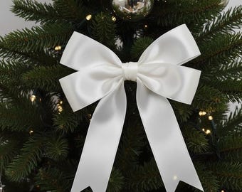 Adorno de la punta del árbol de Navidad con lazo de cinta blanca: elegante decoración navideña