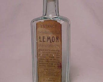 c1890s Extract Lemon prepared by L. P. Farley Boston, Mass., Cork Top blown aqua glass Extract Bottle with paper label