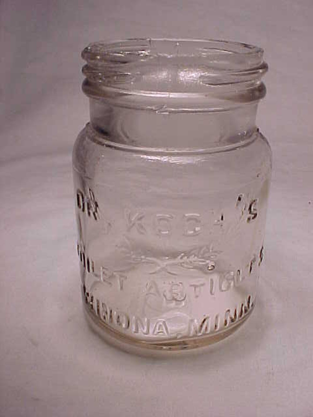 C1915 Dr. Koch's Toilet Articles Winona, Minn. , Clear Glass Embossed 