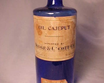 c1890-1900 Oil Cajeput imported by Dodge & Olcott Company Bayonne, NJ. New York, Cork Top Cobalt Blue Essential Oil Bottle, Drug Store Decor