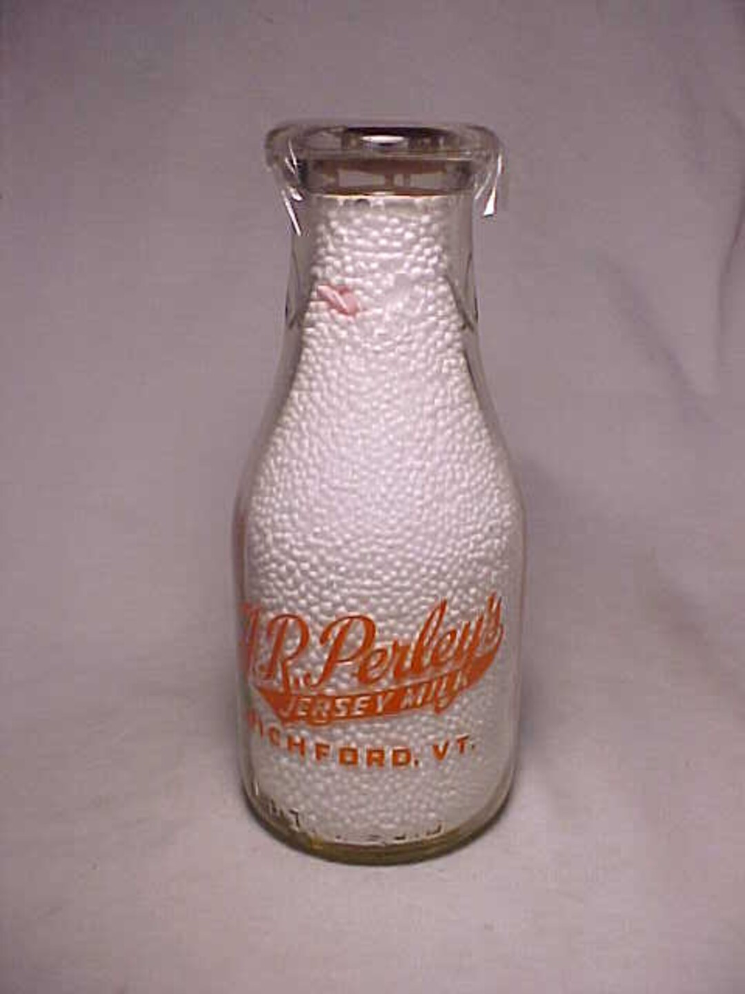 1941 A. R. Perley's Jersey Milk Richford, VT., One Pint Size Orange