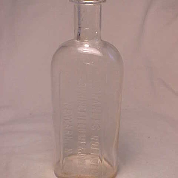 c1890s Charles Roenbeck  Springfield Ave. Newark, N.J. , 6 1/8 inches tall, clear blown glass cork top Druggist Patent Medicine bottle